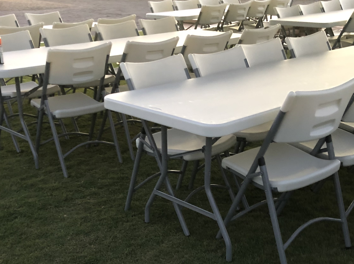 6 foot rectangle table set for an outdoor event in Las Cruces