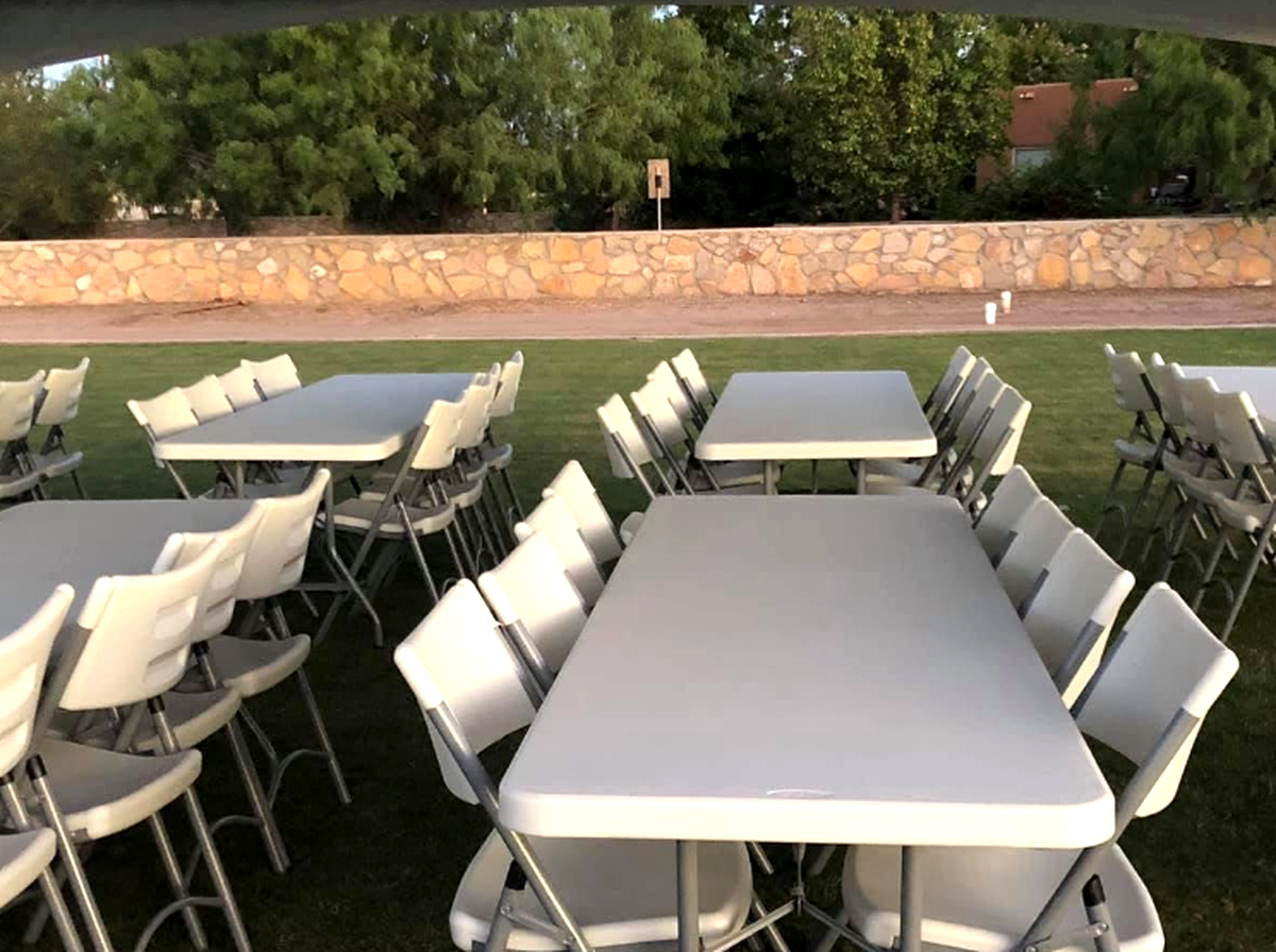 8 foot rectangle table set for a wedding reception